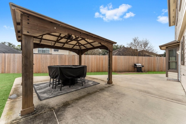 view of patio / terrace featuring a gazebo and a grill