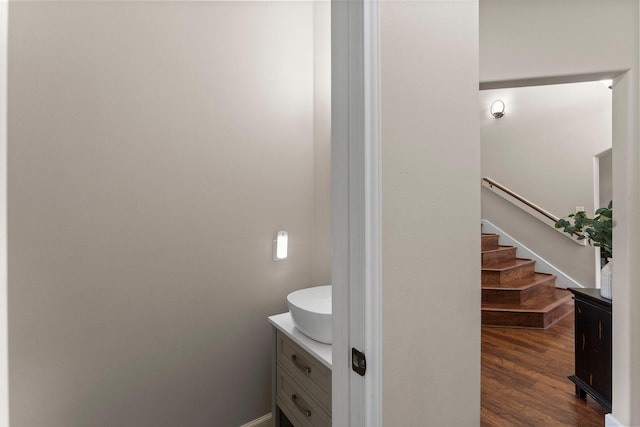 bathroom featuring vanity and wood-type flooring