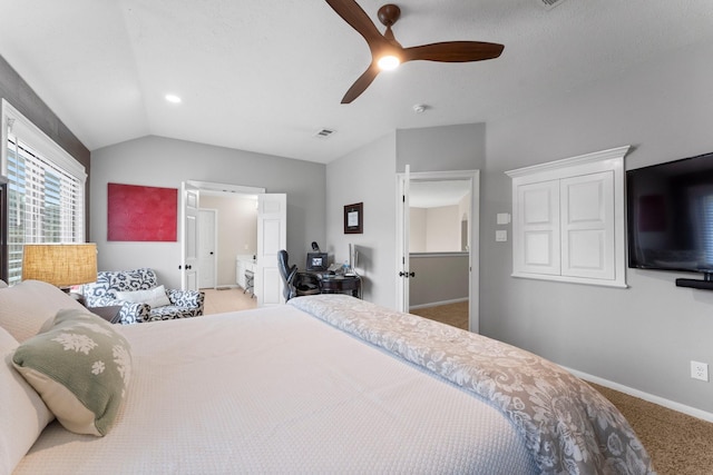 carpeted bedroom with lofted ceiling and ceiling fan