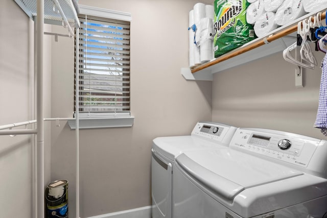 washroom with independent washer and dryer