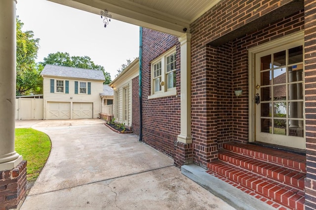 view of patio featuring a garage