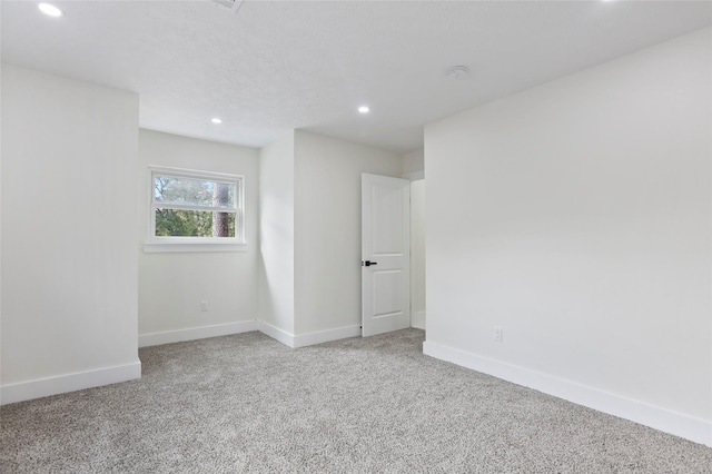 empty room featuring carpet floors