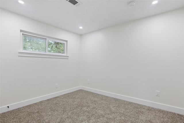 unfurnished room with carpet floors