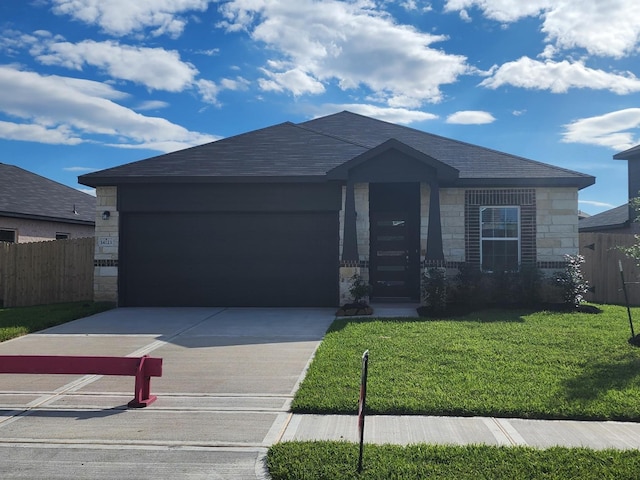 14123 Gingko Ct, Crosby, TX 77532 - view of front of property featuring an attached garage, stone siding, driveway, and a shingled roof