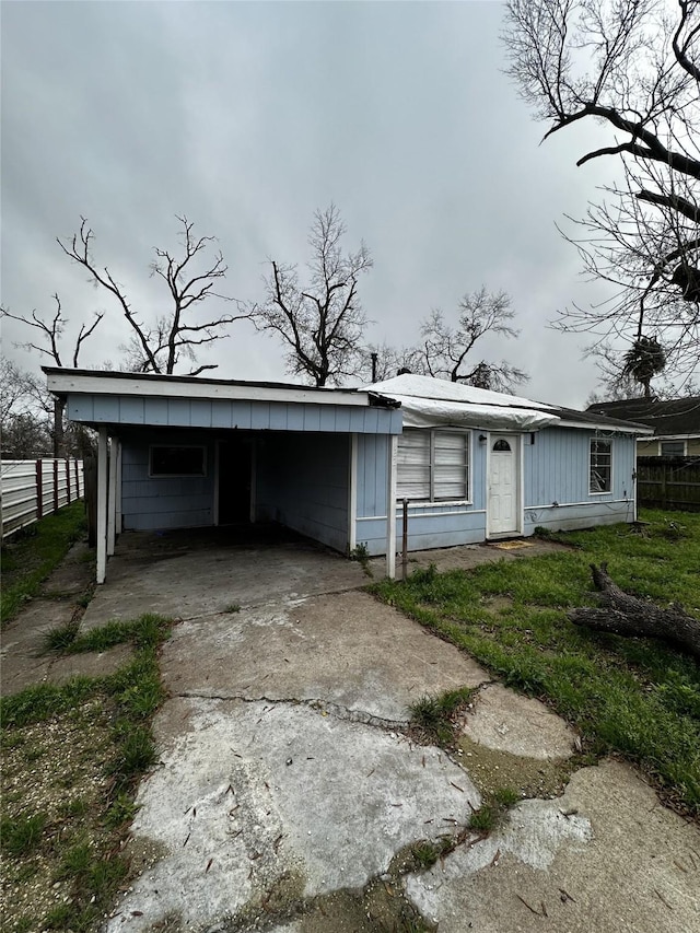 view of front of house with a carport