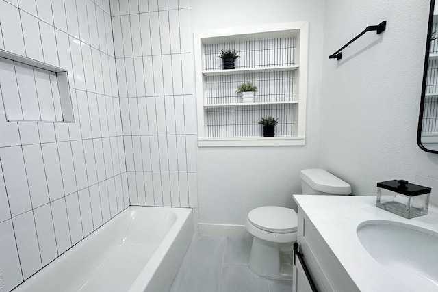 full bathroom featuring vanity, tiled shower / bath combo, and toilet