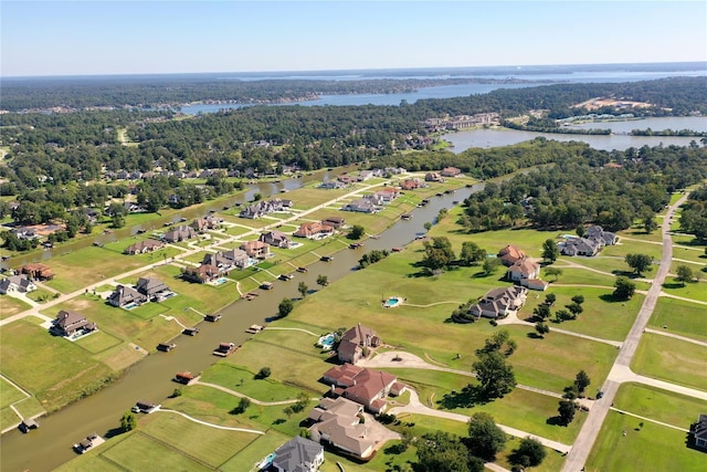 drone / aerial view with a water view