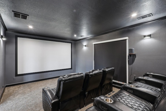 home theater with ornamental molding, carpet flooring, and a textured ceiling