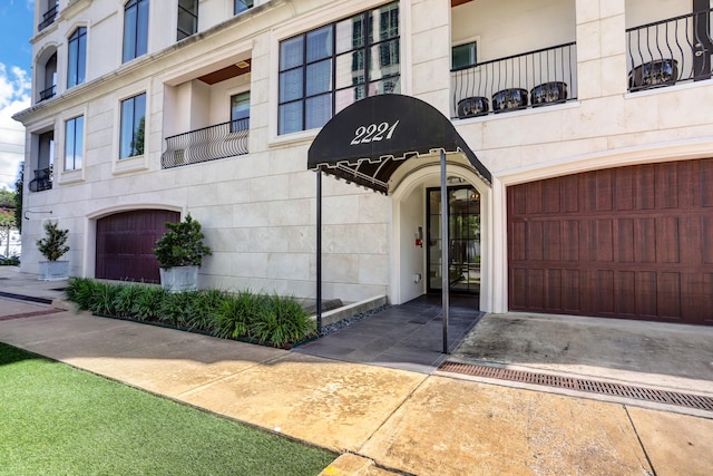 entrance to property featuring a garage