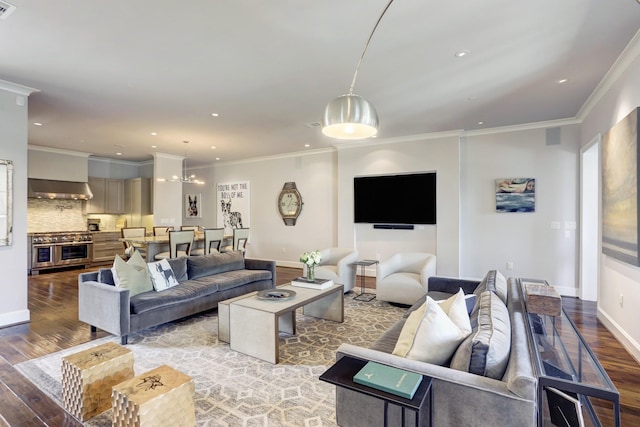 living area featuring ornamental molding, recessed lighting, baseboards, and light wood finished floors