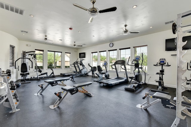 exercise room with ceiling fan