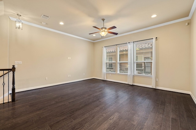 empty room with ornamental molding, ceiling fan, and dark hardwood / wood-style flooring