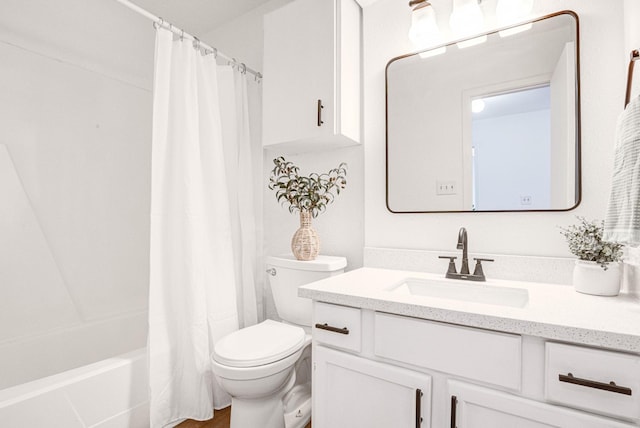 full bathroom with shower / tub combo, vanity, and toilet