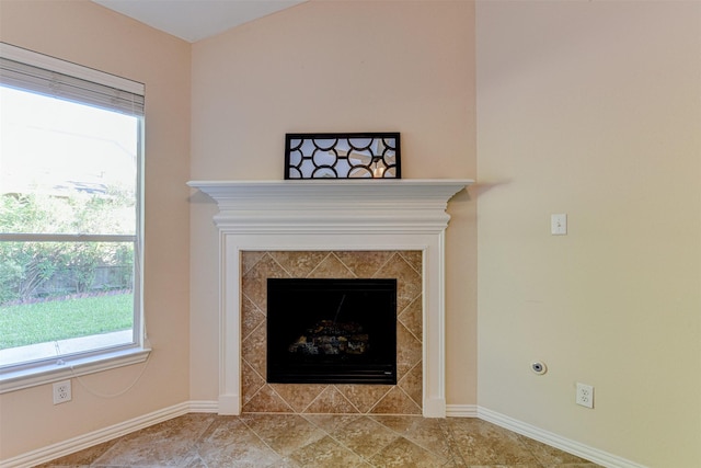 interior details featuring a premium fireplace