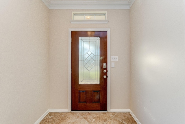 foyer featuring ornamental molding