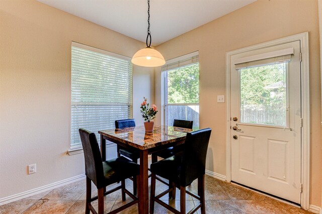 dining room with light tile patterned floors