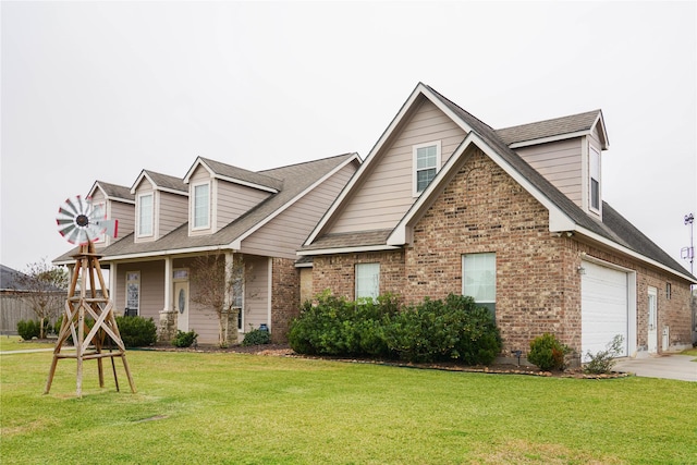 view of front facade with a garage and a front yard