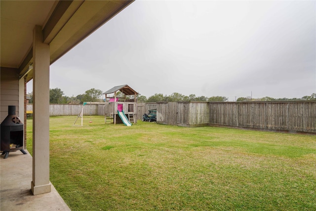 view of yard featuring a playground