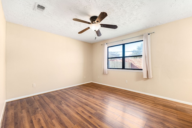 1727 Oakwell Ln, Katy, TX 77449 - unfurnished room featuring wood finished floors, baseboards, a textured ceiling, and ceiling fan