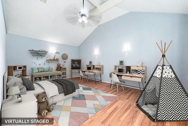 bedroom featuring ceiling fan, high vaulted ceiling, and hardwood / wood-style floors