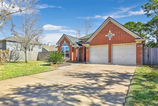 front facade with a garage and a front lawn