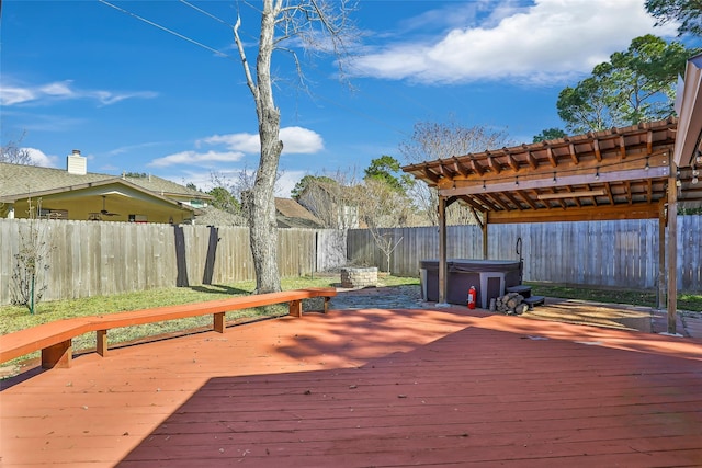 deck with a hot tub