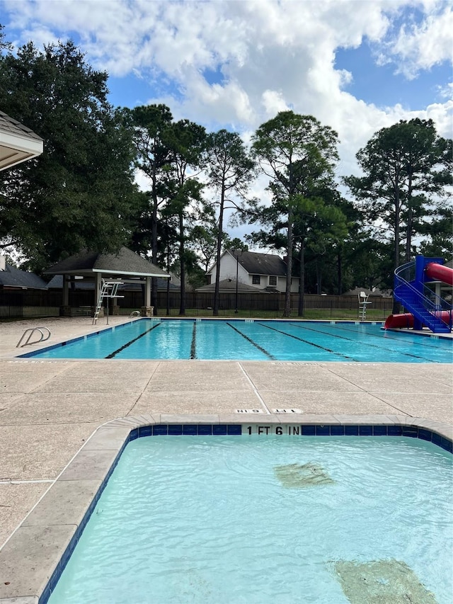 view of swimming pool with a gazebo