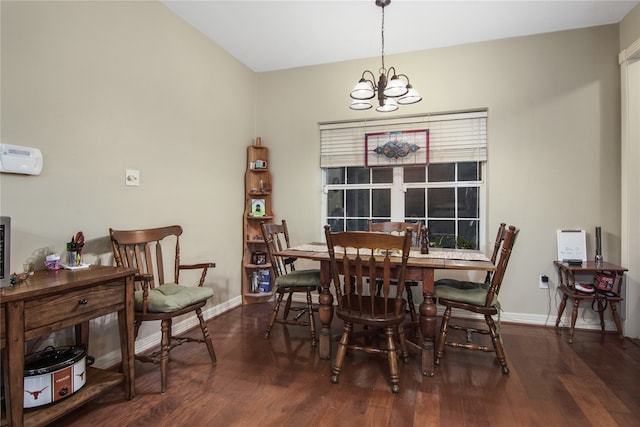 dining area with dark wood-type flooring and a chandelier