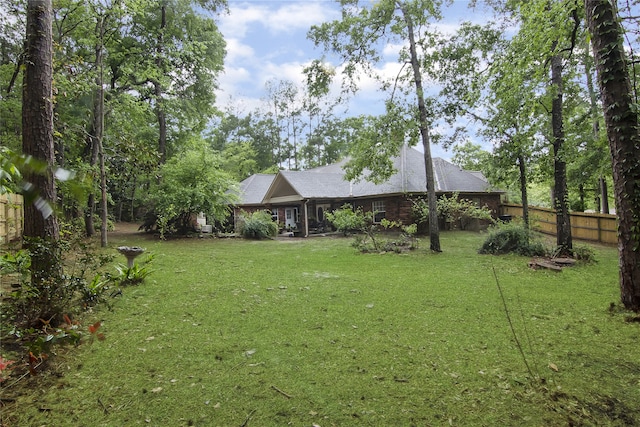 view of yard with fence