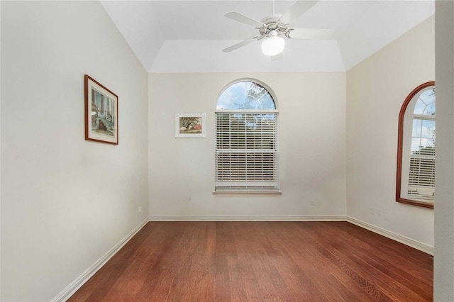 unfurnished room with ceiling fan, baseboards, and wood finished floors