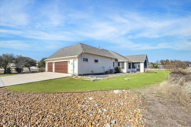 view of home's exterior featuring a garage, central air condition unit, and a lawn