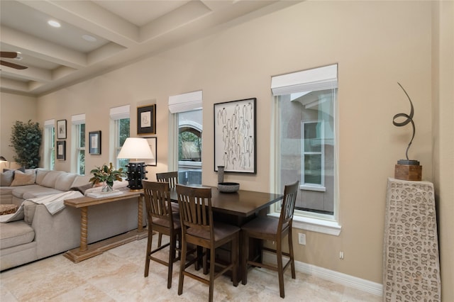 dining room with beamed ceiling, baseboards, coffered ceiling, and a ceiling fan