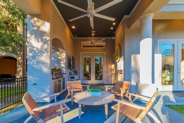 view of patio with french doors, area for grilling, and ceiling fan