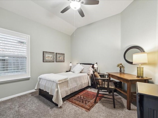 bedroom featuring vaulted ceiling and carpet flooring