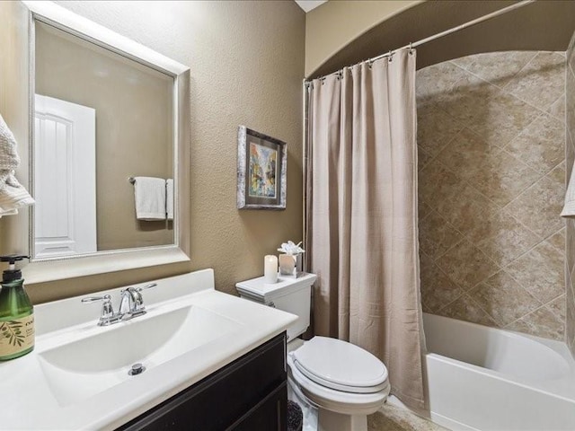 full bathroom featuring vanity, toilet, and shower / bath combo