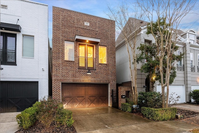 view of front of property featuring a garage