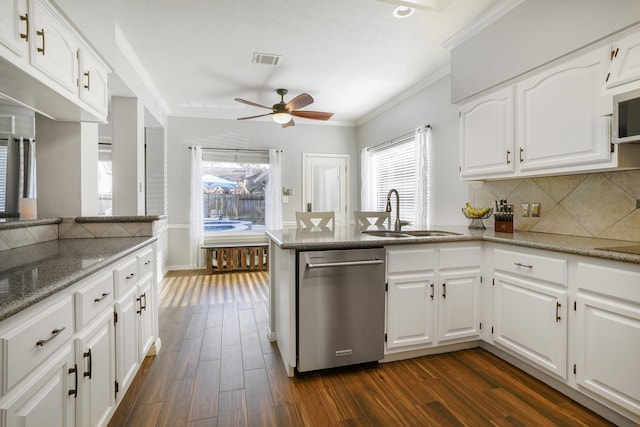 kitchen featuring white cabinetry, dark hardwood / wood-style floors, dishwasher, and sink