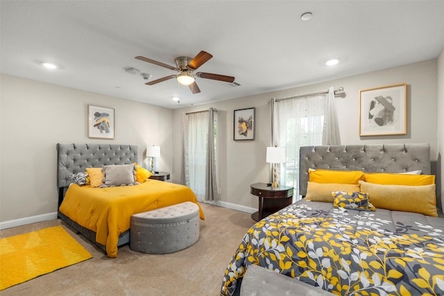 carpeted bedroom featuring ceiling fan