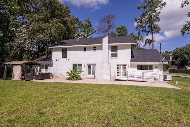 back of house with a patio, a gazebo, french doors, and a yard