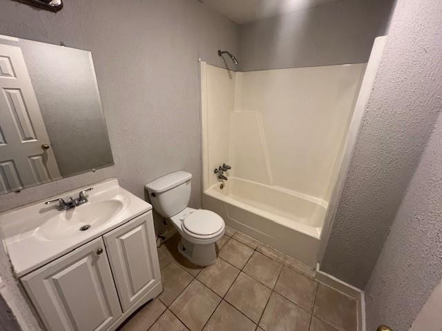 full bathroom with vanity, tile patterned floors,  shower combination, and toilet