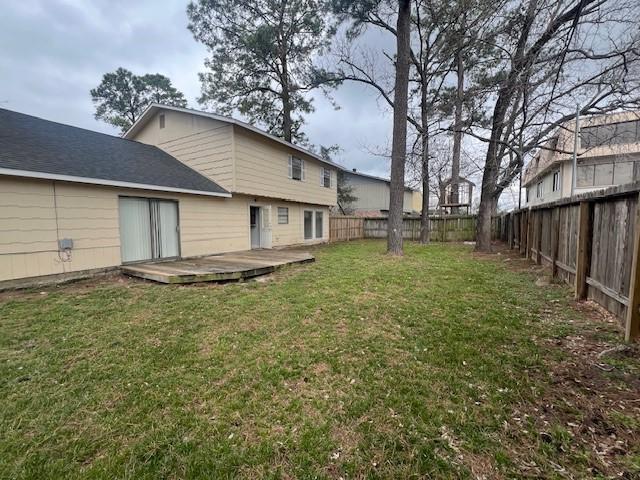 view of yard with a deck