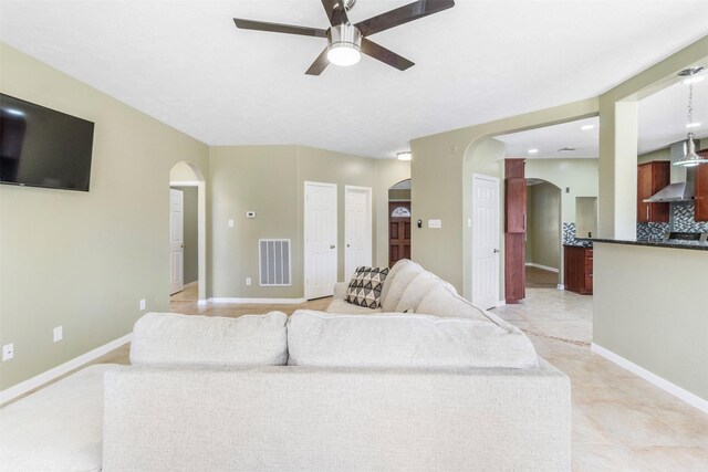 living room with ceiling fan