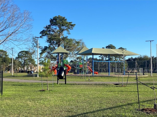 view of play area featuring a lawn