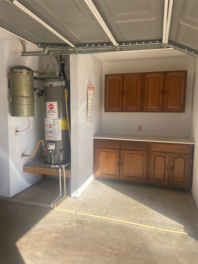 garage featuring gas water heater