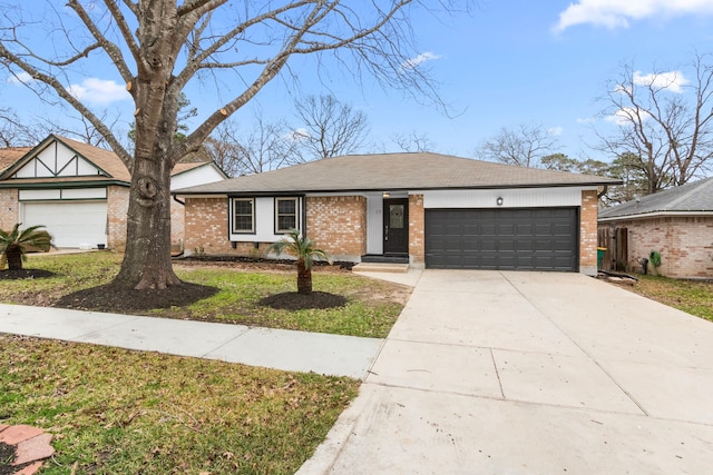 view of front of house with an attached garage, brick siding, a shingled roof, driveway, and a front yard