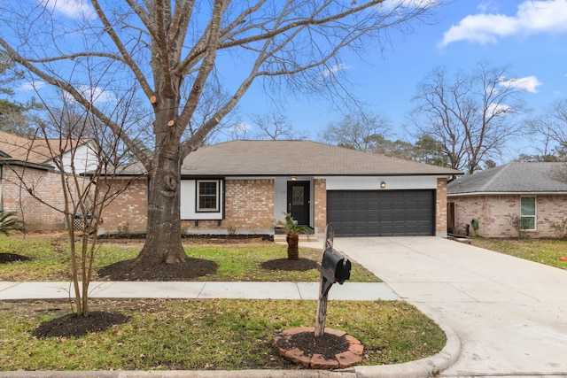 ranch-style home with brick siding, driveway, and an attached garage