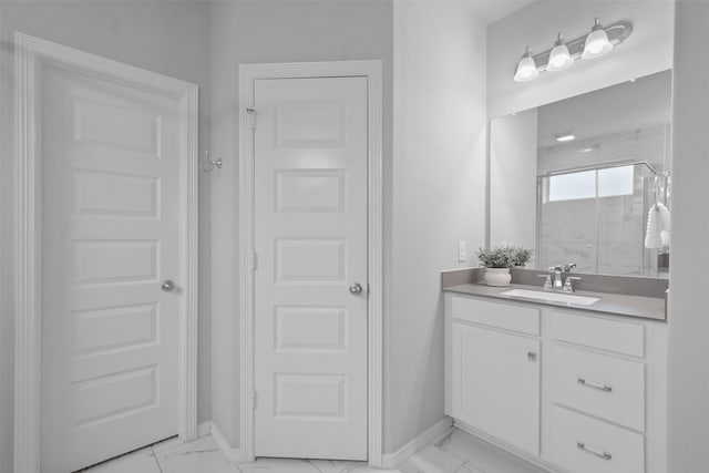 bathroom with an enclosed shower and vanity