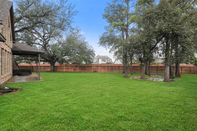 view of yard with a patio area