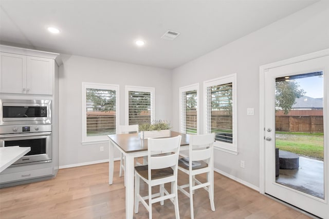 dining area featuring light hardwood / wood-style flooring