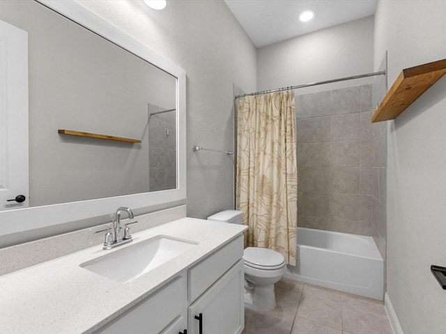 full bathroom with shower / tub combo with curtain, tile patterned floors, toilet, and vanity